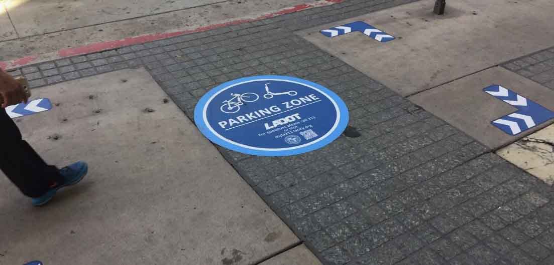 Place removable decals on sidewalks leading people to your business